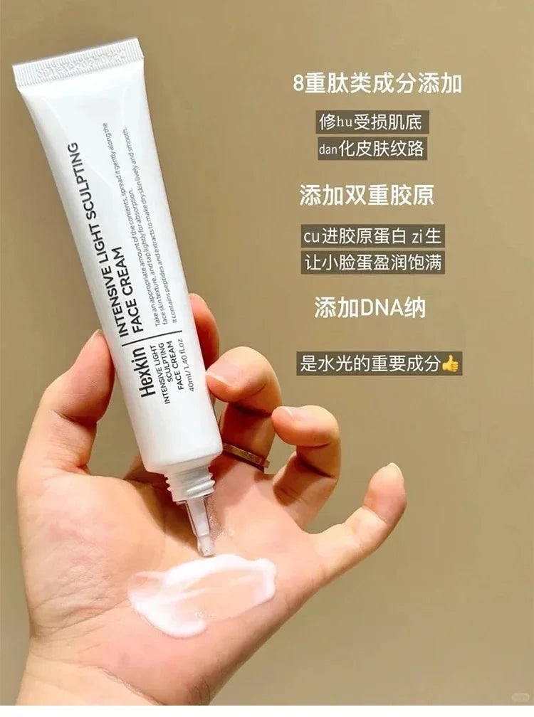 Hand holding a tube of Heklin intensive light sculpting face cream with text on a beige background